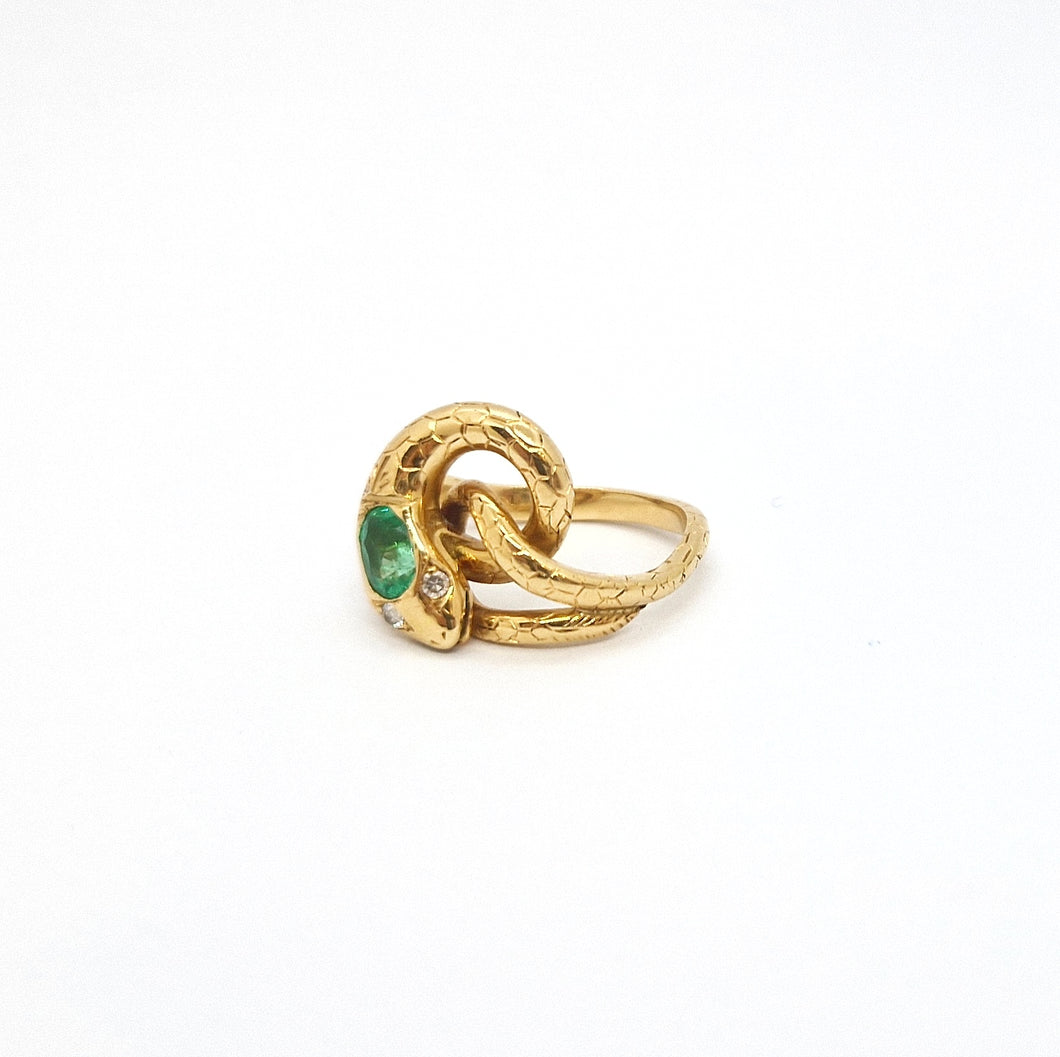 Anello serpente con smeraldo e diamanti in oro giallo 18 kt