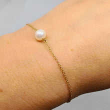 Carica l&#39;immagine nel visualizzatore di Gallery, Bracciale in oro giallo 18 kt e perla
