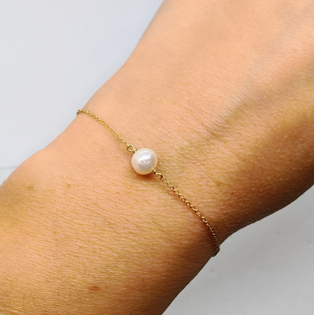 Bracciale in oro giallo 18 kt e perla