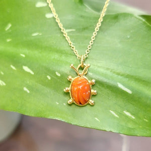 Collana coccinella corallo in oro giallo 18 kt